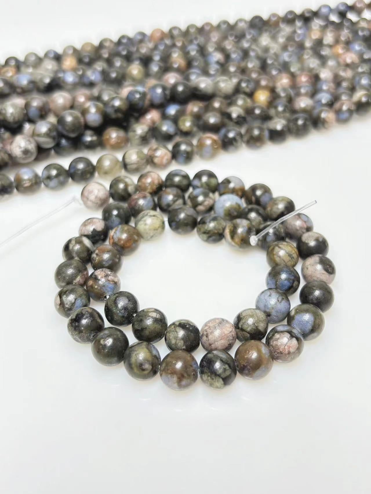 8mm Que sera beads strand