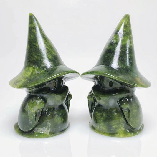 Green jade ghost with witch hat carving