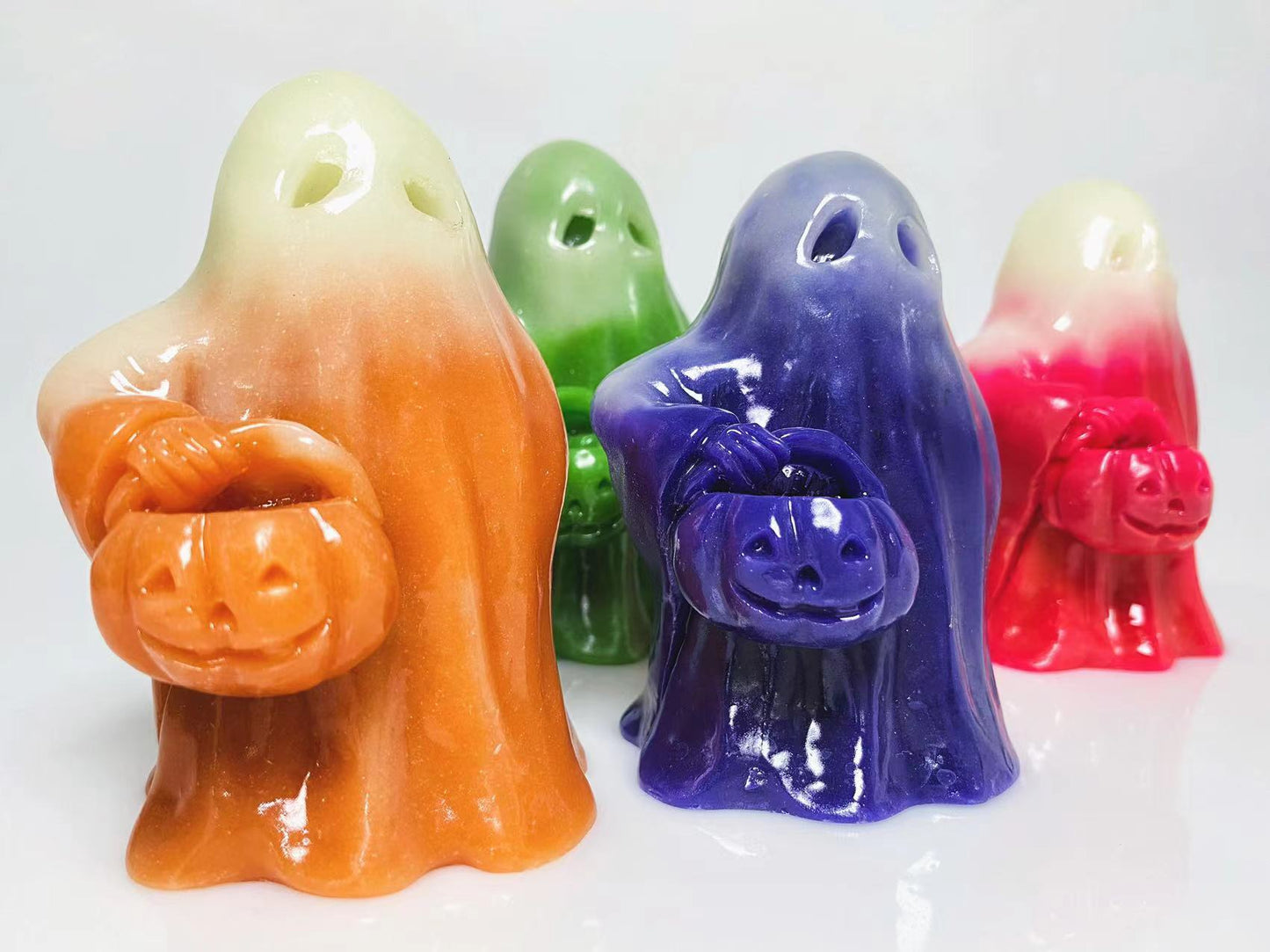 Luminous ghost with pumpkin carving