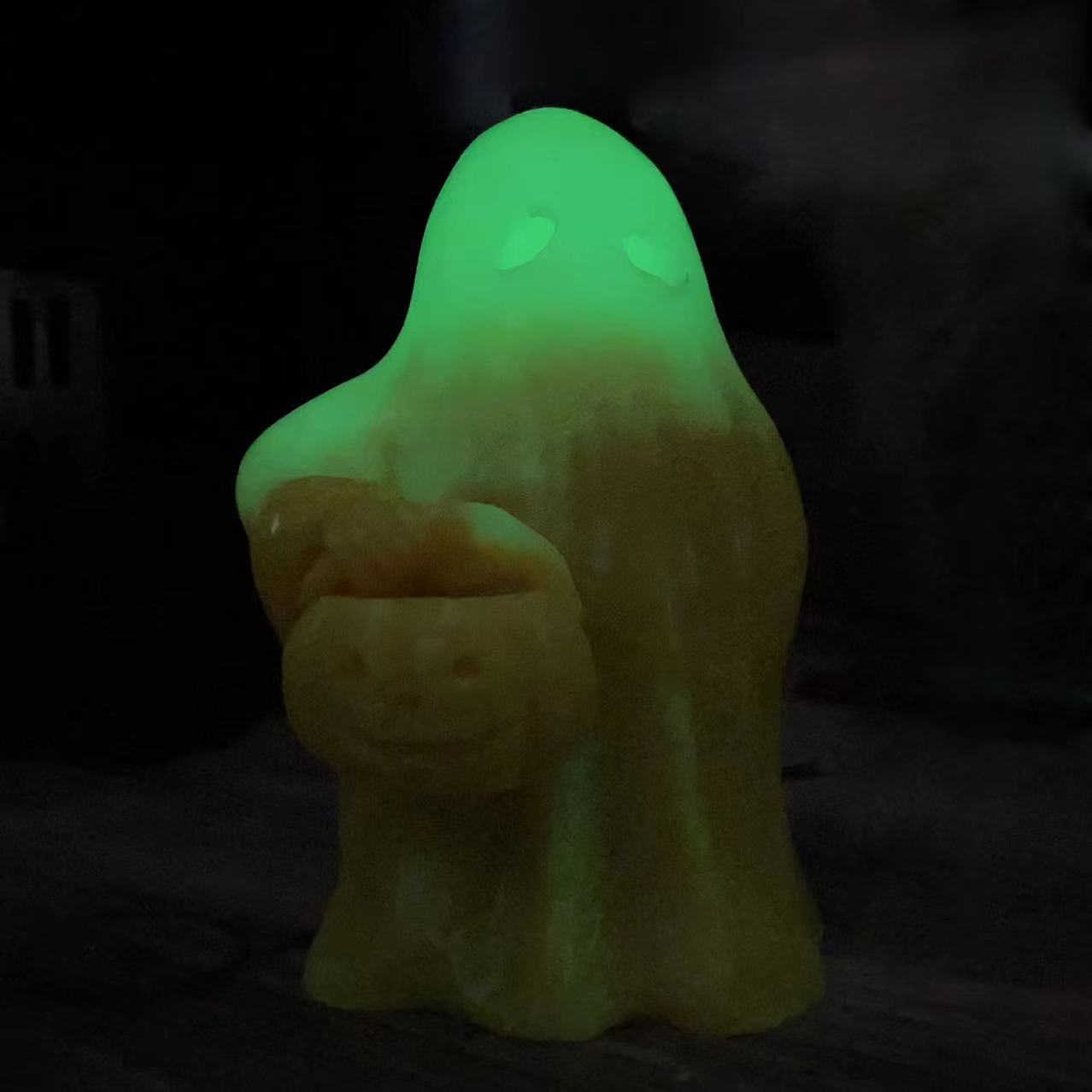 Luminous ghost with pumpkin carving