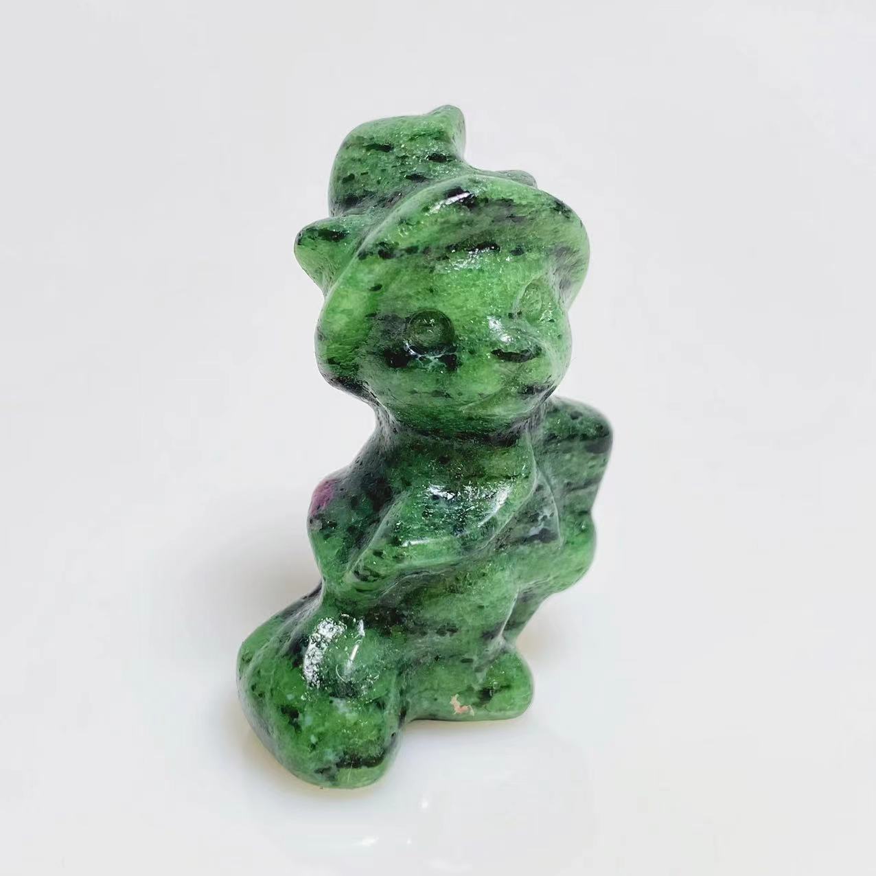 Halloween magic cat on broom carving