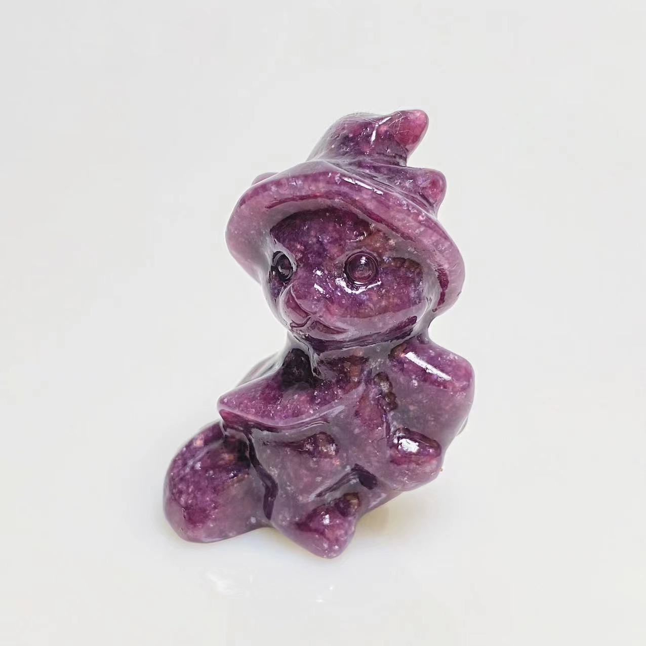 Halloween magic cat on broom carving