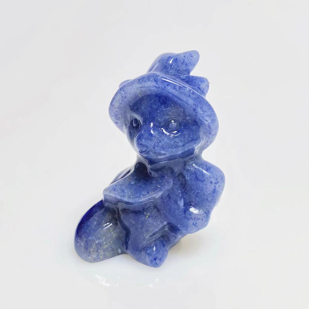 Halloween magic cat on broom carving