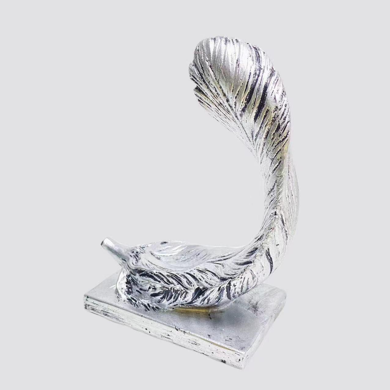 Resin feather sphere stand
