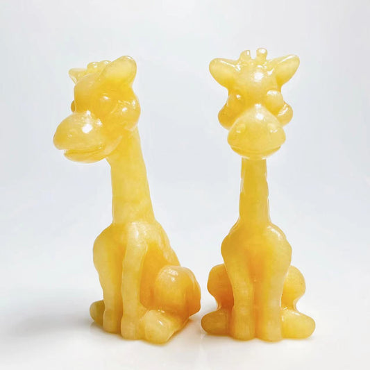 Yellow calcite giraffe carving