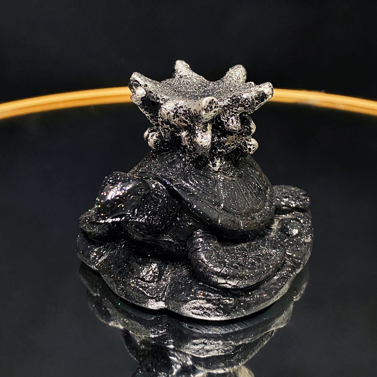 Resin turtle with coral sphere stand