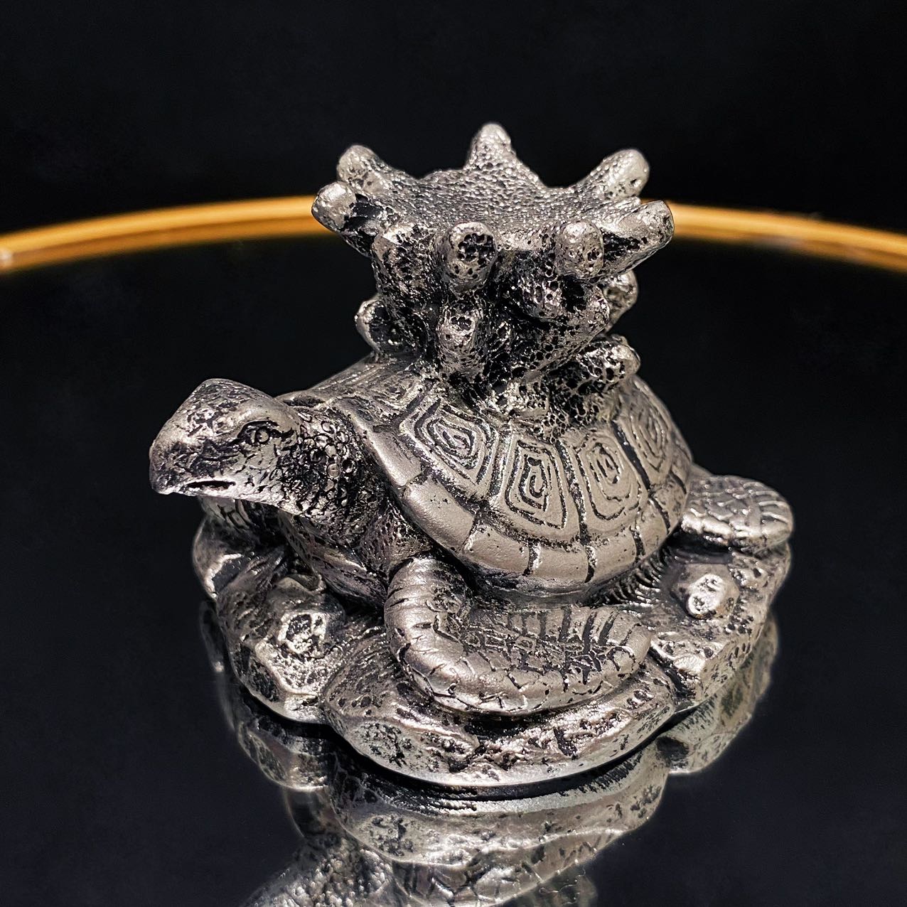 Resin turtle with coral sphere stand