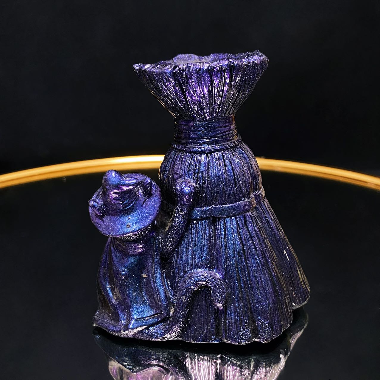 Resin broom with magic cat sphere stand