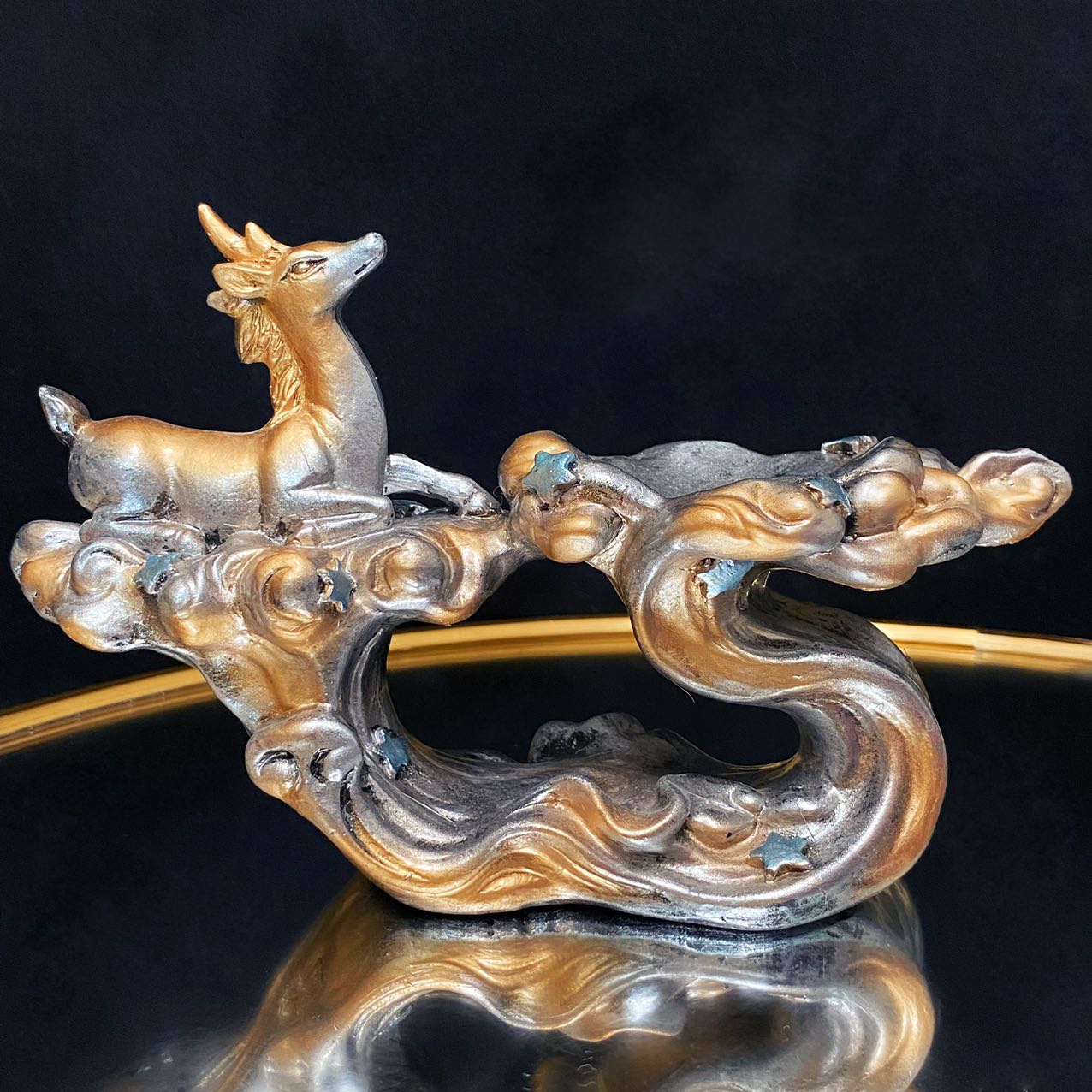 Resin water with deer sphere stand