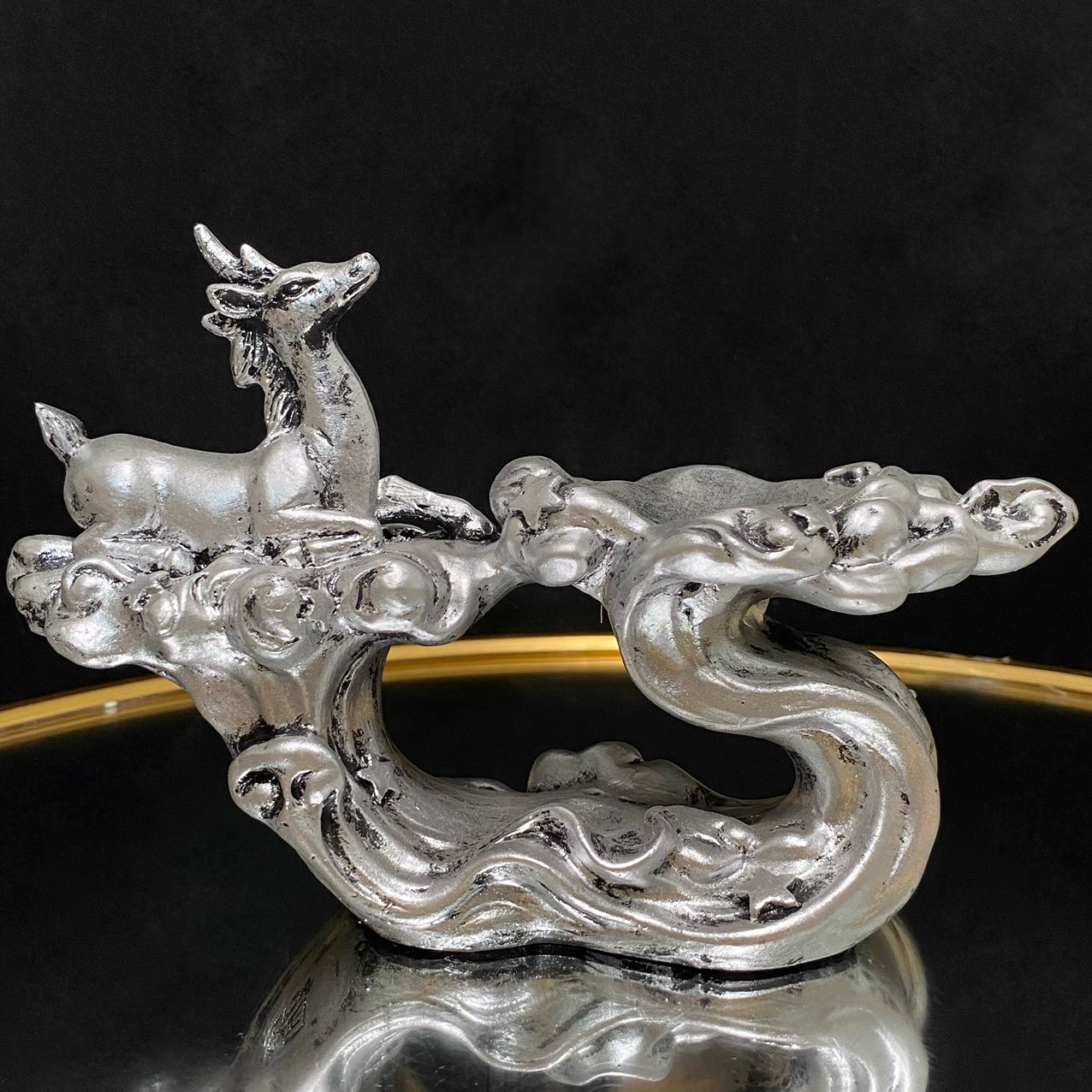 Resin water with deer sphere stand