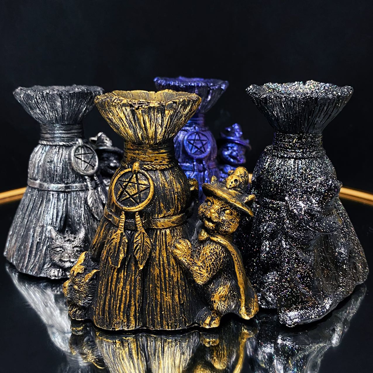 Resin broom with magic cat sphere stand
