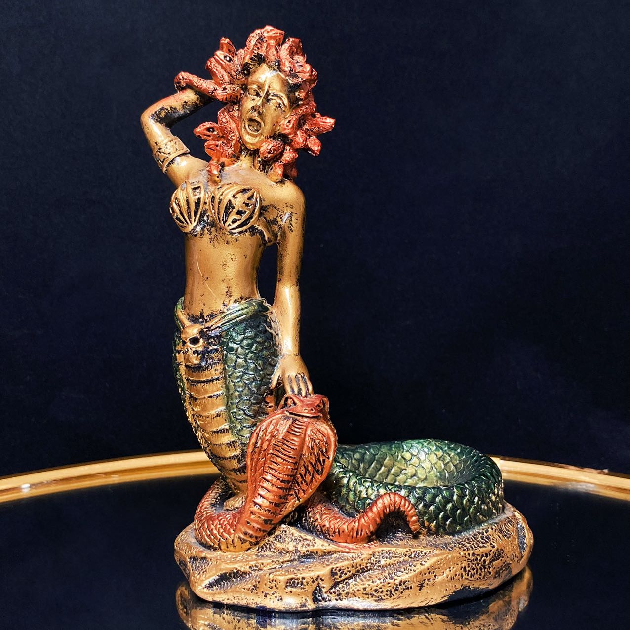 Resin medusa sphere stand