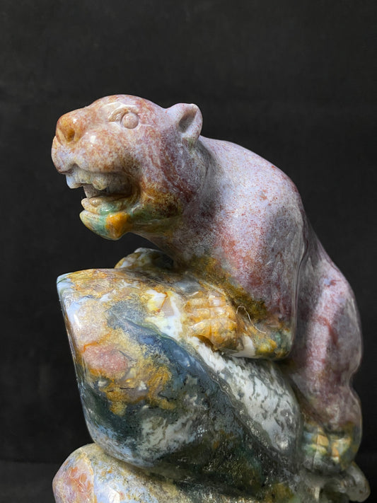 Ocean jasper tiger on stone carving