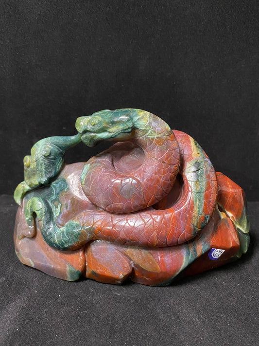 Ocean jasper snake on stone#1300