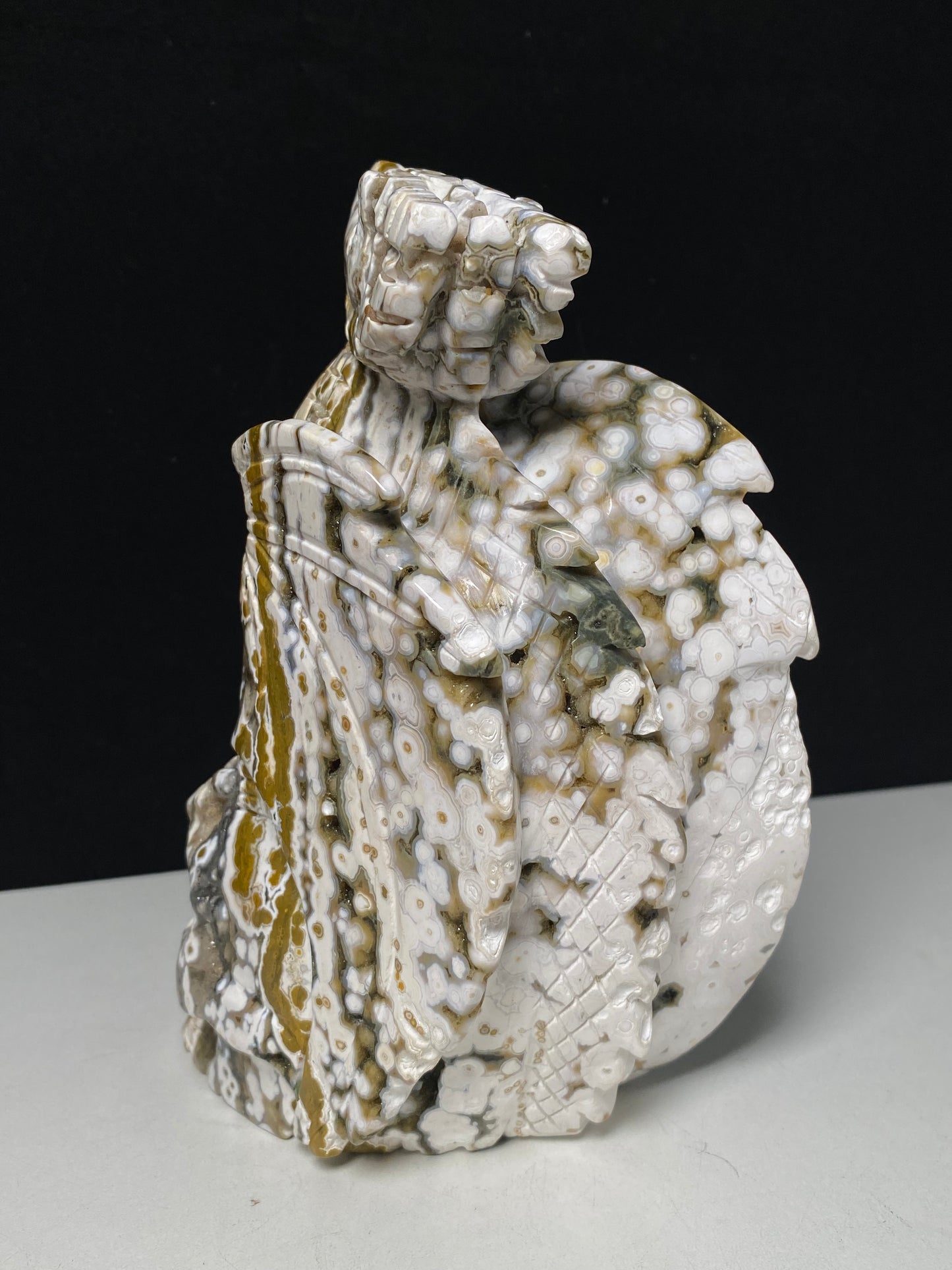 068-Ocean jasper with circles flying dragon on skull carving #1570
