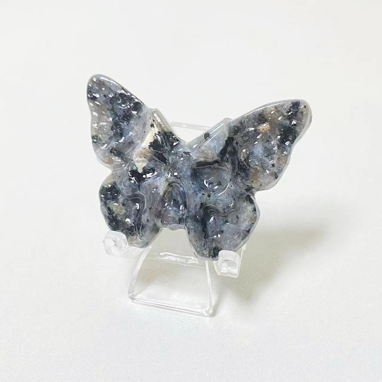 Crystal butterfly skull carvings