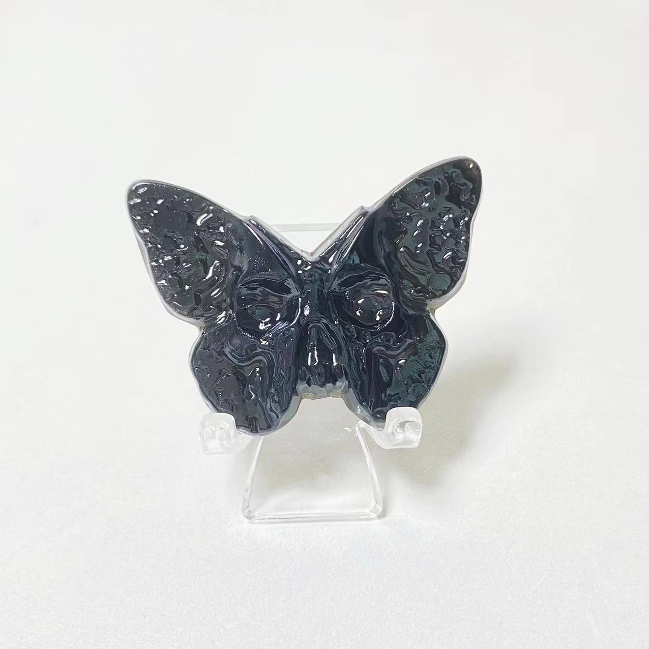 Crystal butterfly skull carvings