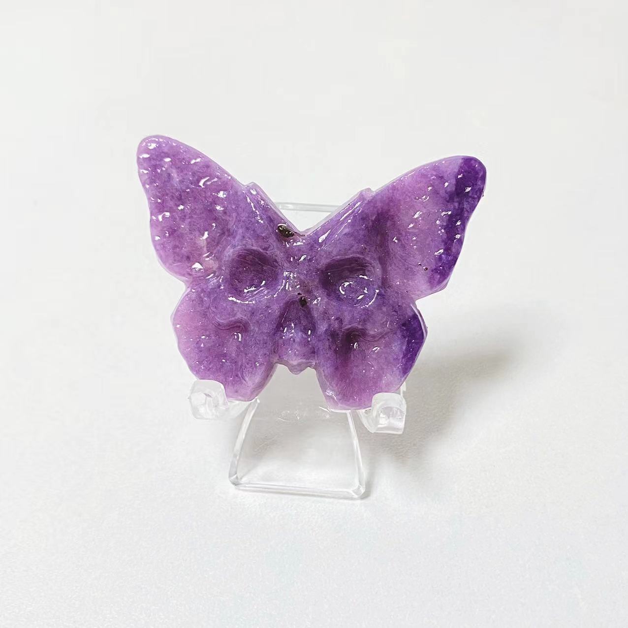 Crystal butterfly skull carvings